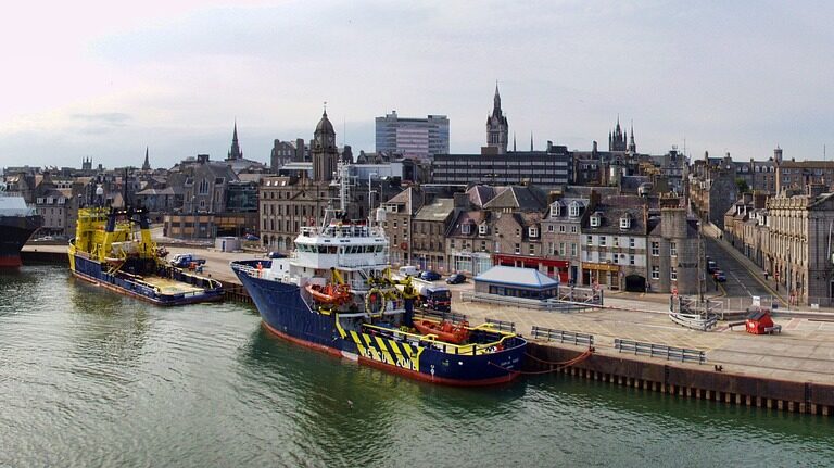 A shot of Aberdeen Harbour, with a boat and buildings