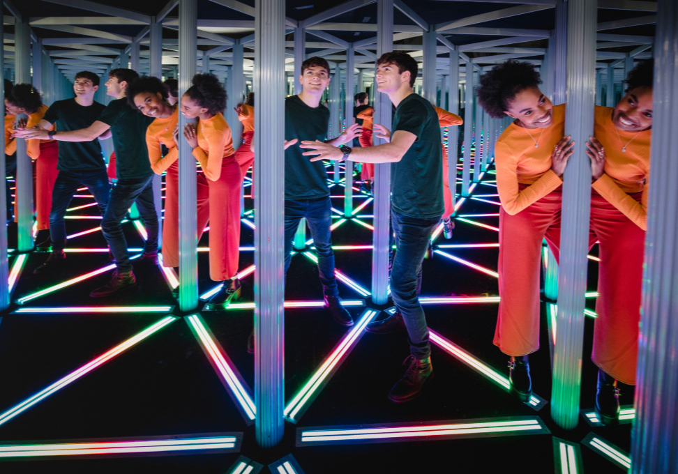 Two people enjoy a maze at the Camera Obscura.